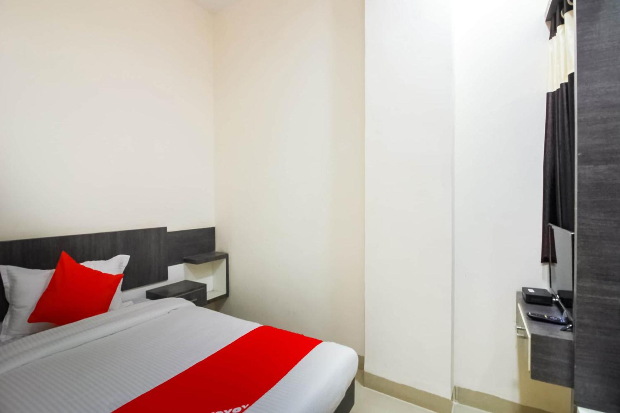 Hotel O Unique Inn Dhule Экстерьер фото